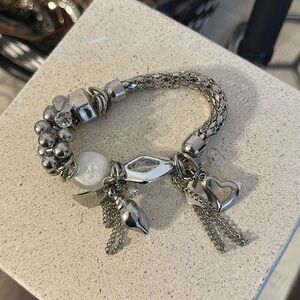 Adjustible Bracelet With Multiple Charms